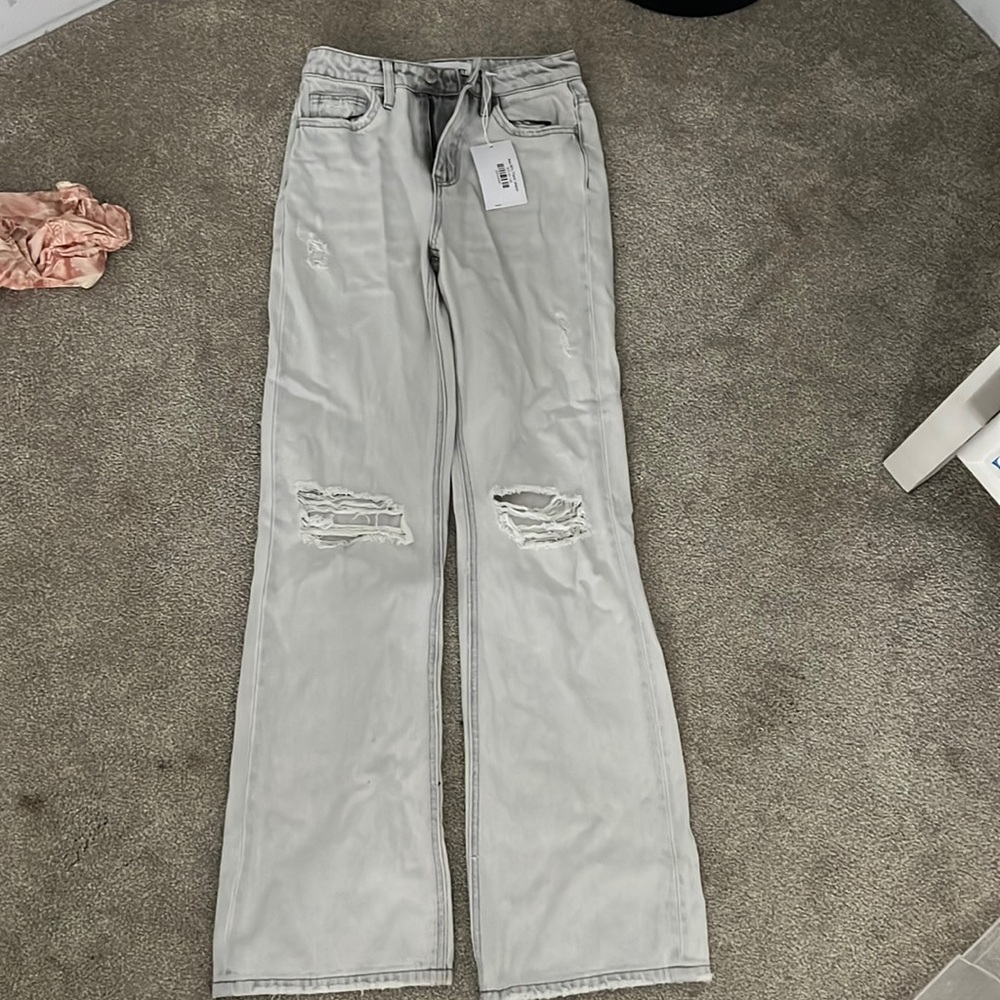 Light gray bootleg ripped jeans
